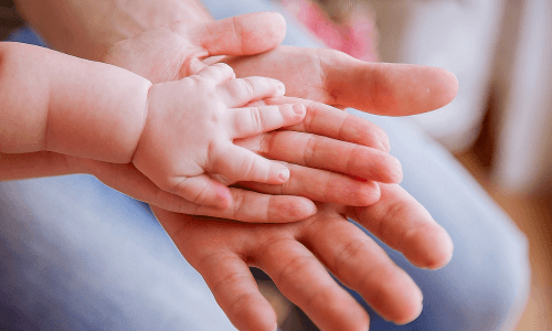 Family hands, three sets